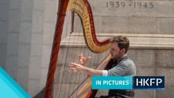 In Pictures: Russian harpist plays in Hong Kong to commemorate victims of one year of war in Ukraine